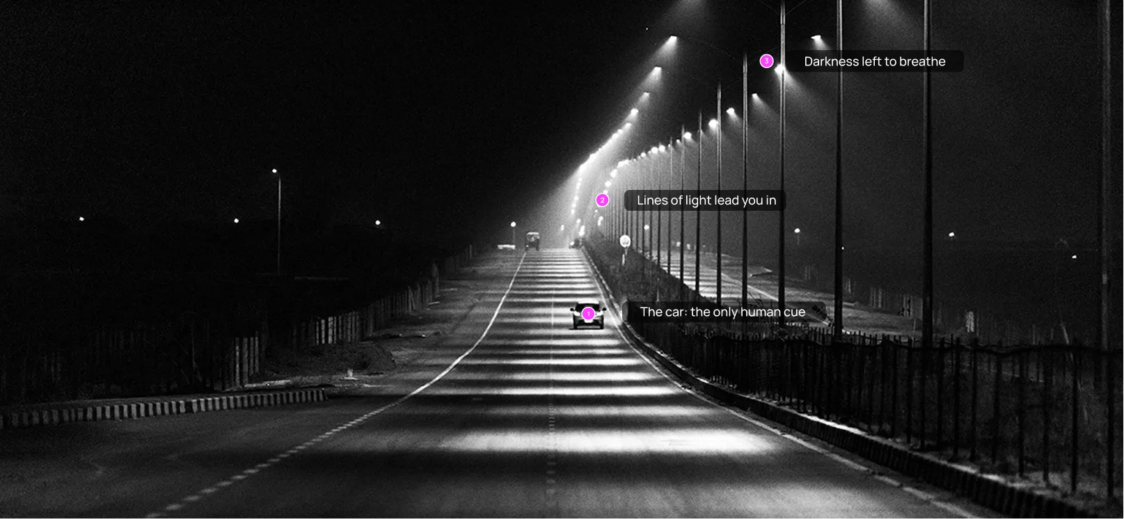 Dark road lit by streetlights (placeholder)